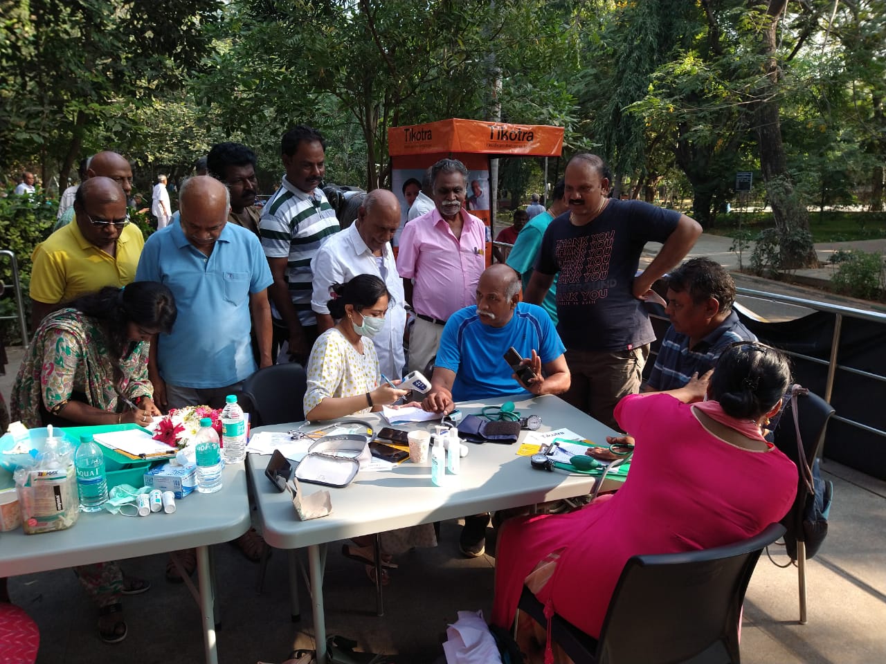 Tikotra's Doctor and Medical Professionals checking vitals at a medical camp in Anna Nagar park, Chennai