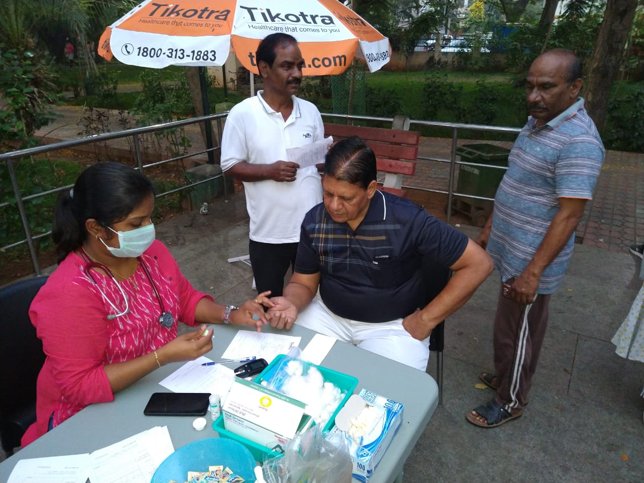 Tikotra's MBBS Doctor checking vitals at a medical camp in Anna Nagar Park, Chennai India